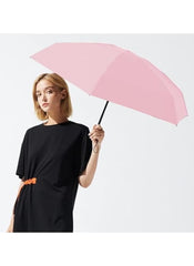 Mumzar pink dual purpose automatic umbrella held by woman in black dress for rain or sun protection