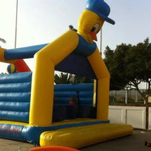 Inflatable bouncy castle with duck mascot figure, yellow frame and blue walls