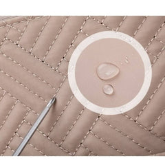 Close-up of waterproof fabric on Huitich stylish baby travel bag with stitched quilted pattern