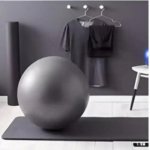 Black exercise mat on the floor