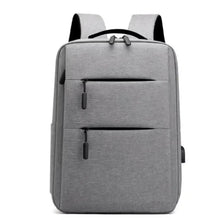 Gray laptop backpack with top handle, black straps, and two front pockets.