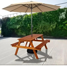 Wooden picnic table with two benches under a beige patio umbrella, brown frame