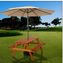 Outdoor picnic table with two benches and center umbrella pole, brown wood