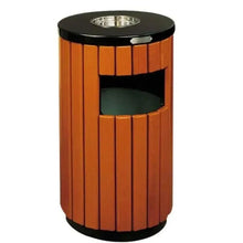 Wooden waste bin with slatted sides and black lid, metal top opening