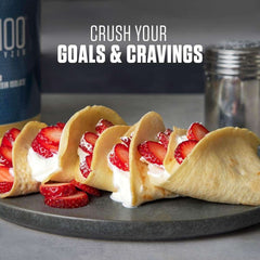 Dymatize ISO100 hydrolyzed protein powder next to strawberry and cream filled crepes on plate with shaker and promotional text