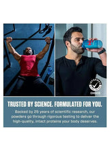Whey protein isolate supplement used for workouts, blue shaker cup held by man