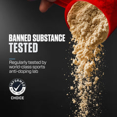 Dymatize ISO100 whey protein isolate being poured from a red scoop, showcasing quality and testing standards