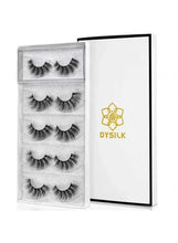 Reusable false strip eyelashes set with five wispy lash pairs in clear box