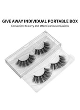 False eyelash strip set with wispy lashes in clear plastic dividers