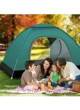 Green beach camping tent with open front and two mesh panels