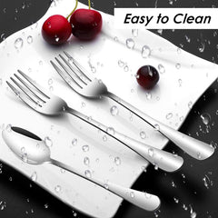 Huitich 12 piece cutlery set with forks and spoons on white plate with water droplets highlighting easy to clean