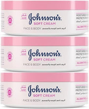 3-pack Johnson's Soft Cream face & body jars with pink lids, stacked packaging