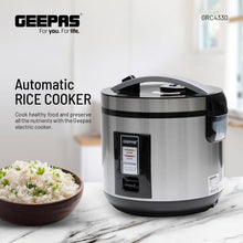 Automatic rice cooker with stainless body, black lid, and side carry handles