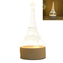 Eiffel Tower 3D LED lamp, glowing white tower on dark base.