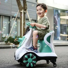 Kids electric bubble car in white and mint green, child riding and smiling