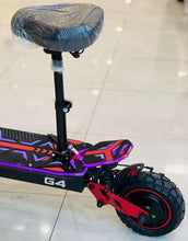 Electric scooter with seat and purple multicolor deck, G4 badge