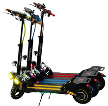 Electric scooter, black deck with red stripes, bright front and side lights, rear foot deck