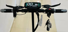 Electric scooter front view with handlebar display, dual lights, and hanging key holder