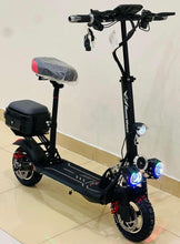 Black electric scooter with padded seat, front headlight, and blue-lit wheel area