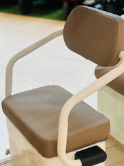 Comfortable brown seat with armrests for an electric tricycle UAE ensuring a smooth ride