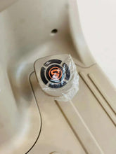 Electric tricycle front compartment with a round speaker or control cap