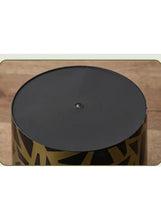 Round trash can lid, dark top with small center knob, gold patterned sides