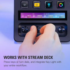 Hand adjusting controls on Stream Deck used with Elgato Key Light for streaming setup