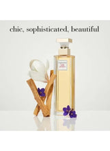 Elizabeth Arden 5th Avenue EDP spray bottle with gold liquid, white cap, and label