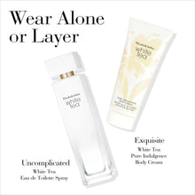 Clear white perfume spray bottle with gold cap, shown with matching tube