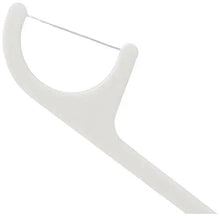 White floss toothpick with looped thread, angled fork end