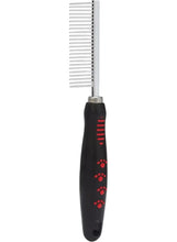 Pet grooming comb with wide metal teeth and black paw-print grip handle, red accents