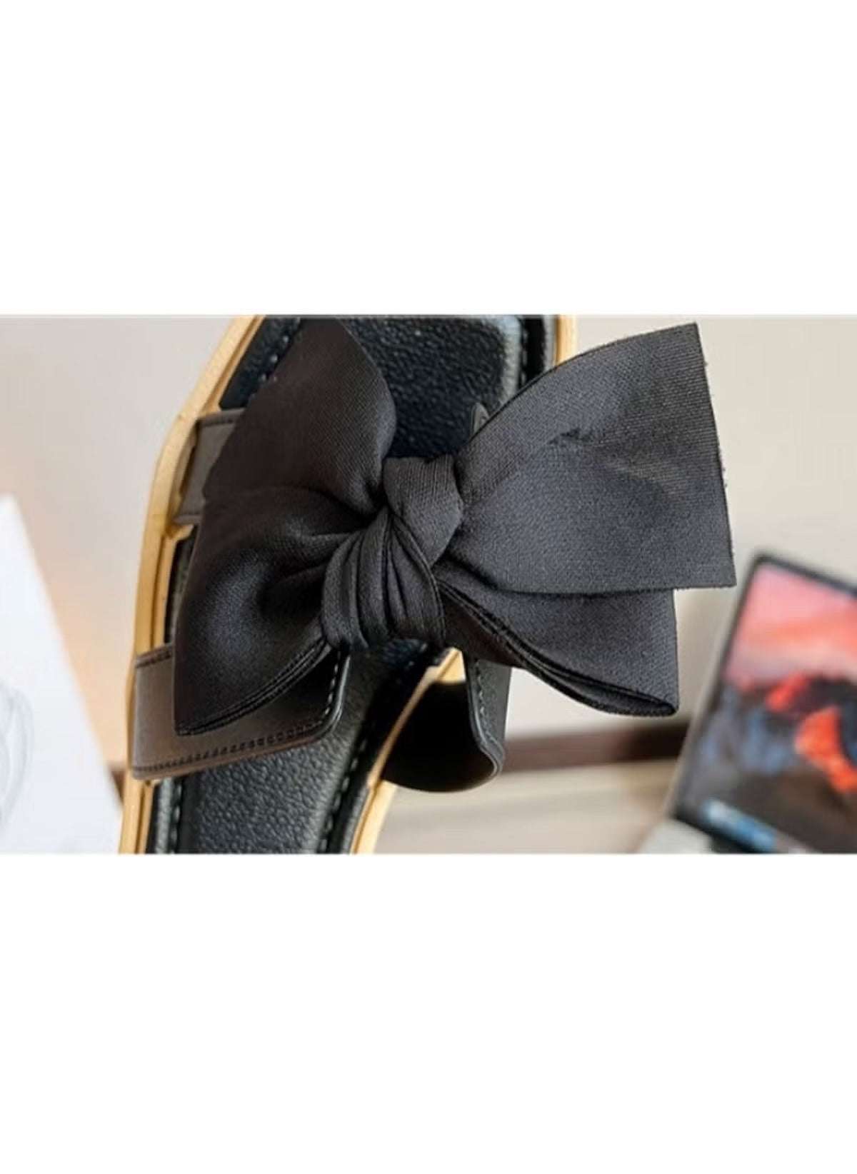 Huitich black fairy style wedge sandals with a large bow detail on the strap