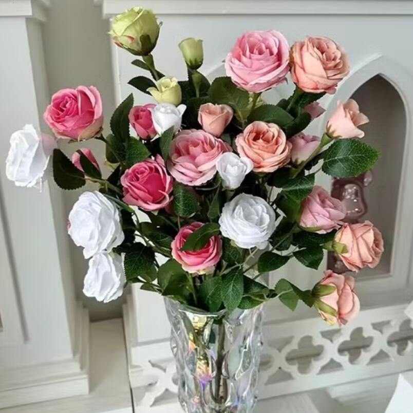 Huitich artificial flowers featuring colorful fake roses for home decoration in a clear glass vase