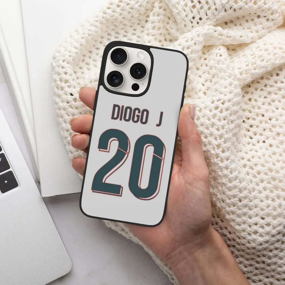 Diogo Jota iPhone 15 Pro case white soccer jersey design number 20 teal on black bumper held in hand
