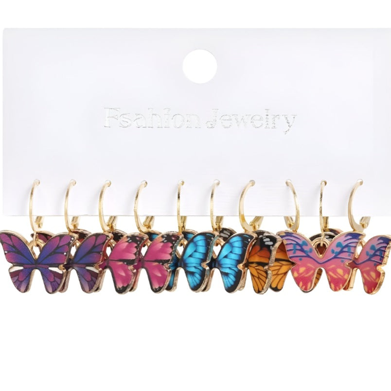 Huitich 5 piece dangle earrings for women featuring colorful butterfly designs on gold hoops