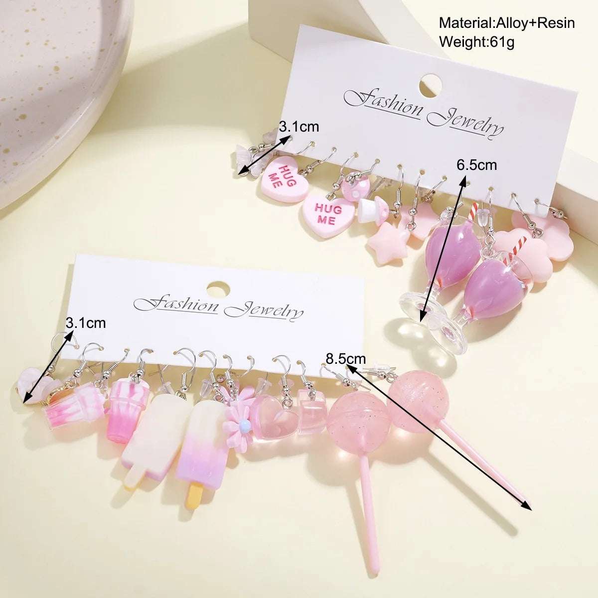 Huitich pink dangle charm earrings set with heart, star, and dessert designs in soft pastel pink