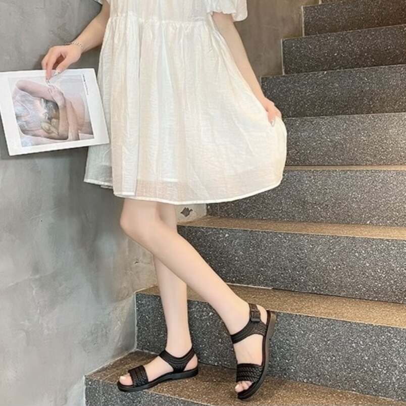 Huitich fashion sandals for women sizes 40 41 in black on model wearing white dress on stairs