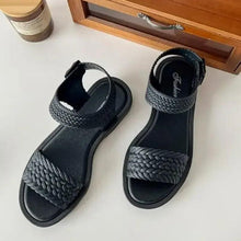 Huitich black sandals with braided upper, open toe and ankle strap, side-by-side