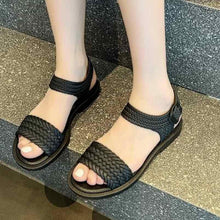 Huitich black braided slide sandals with open toe and ankle strap, worn