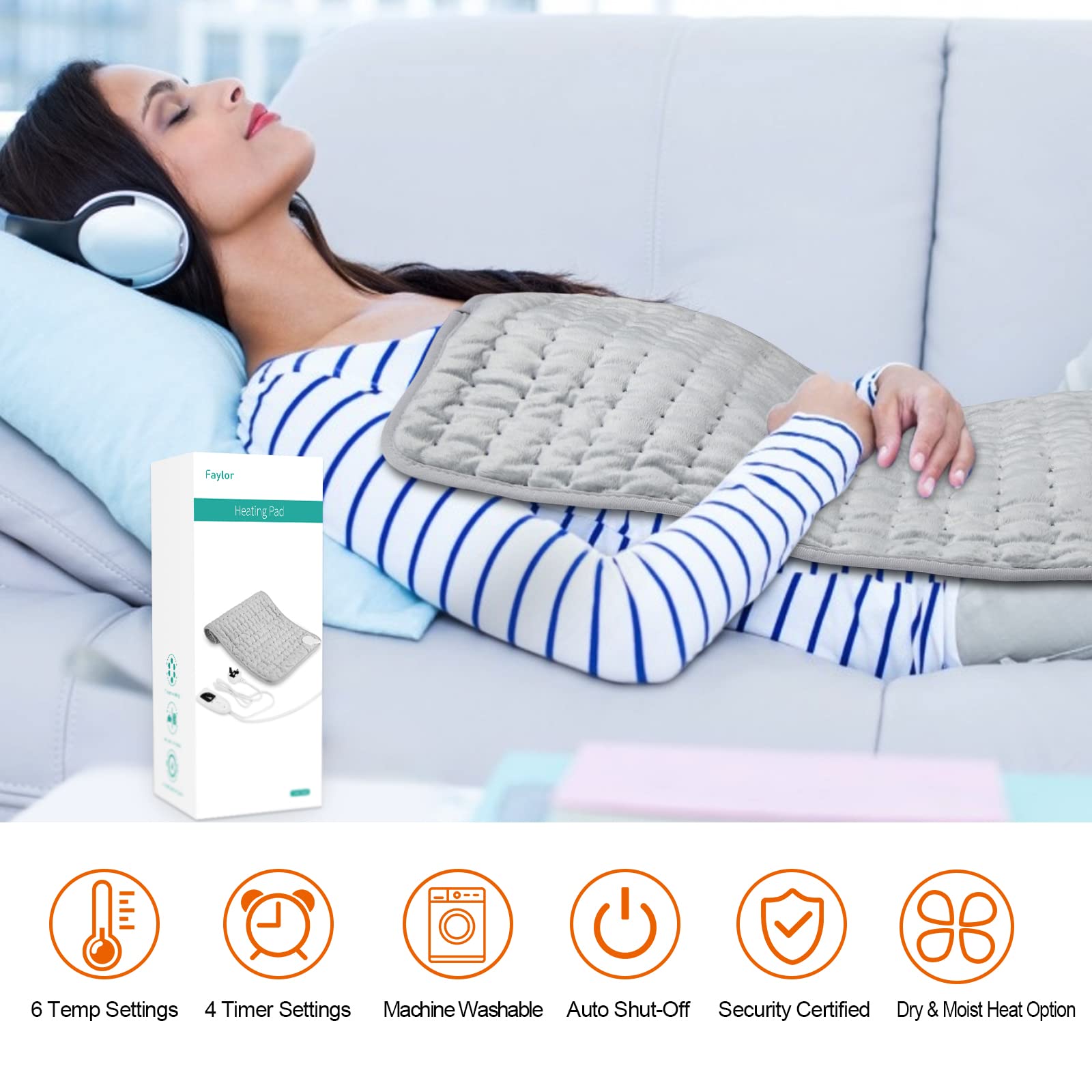 Faylor electric heating pad for pain relief on woman reclining with gray quilted pad over abdomen and product box