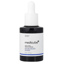 Medicube skincare serum bottle with white dropper, dark base, 30 ml.