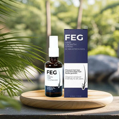 FEG hair growth oil spray in a brown bottle on a wooden tray, with packaging and a natural background