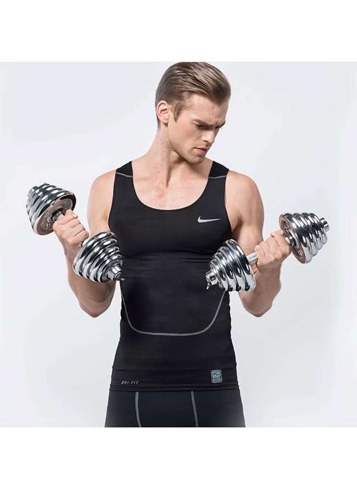 Man lifting 2-in-1 dumbbell barbell set for beginners with adjustable weights for home workouts