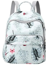 Light gray floral print baby travel bag with top handle and front zipper pocket
