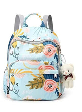 Blue kids travel backpack with colorful animal, rainbow and cactus print, front zip pocket