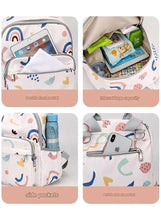 Blue travel backpack with front pockets, side pockets, and visible zipper compartments