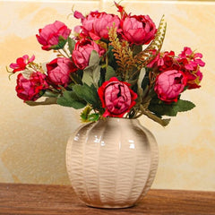 Huitich artificial mini peony bouquet with vibrant pink flowers in a textured beige vase