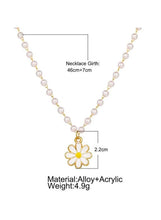 Pearl beaded necklace with daisy pendant; 46+7cm length; 2.2cm charm