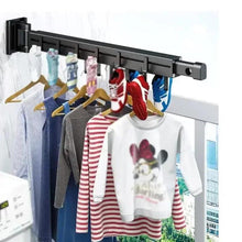Wall-mounted foldable clothes hanger rack with long bar and row of hanging hooks