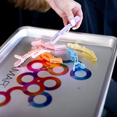 Huitich colorful hair sectioning clips 10 pack on a tray with hand holding a lavender clip